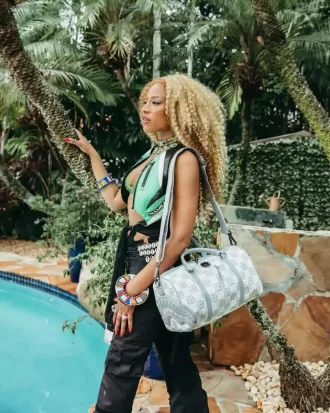 A.I.8 AFRICAN INTELLIGENCE BOOKED & BUSY MINI DUFFLE A.I.8 AFRICAN INTELLIGENCE BOOKED & BUSY MINI DUFFLE