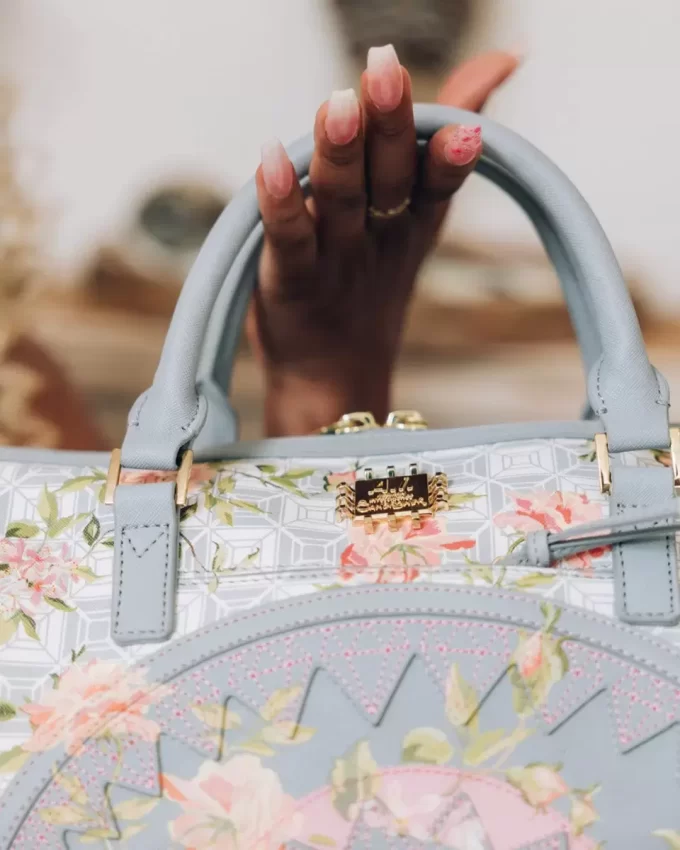 A.I. AFRICAN INTELLIGENCE ELEGANT ENERGY MINI DUFFLE – SANDFLOWER COLLAB A.I. AFRICAN INTELLIGENCE ELEGANT ENERGY MINI DUFFLE – SANDFLOWER COLLAB