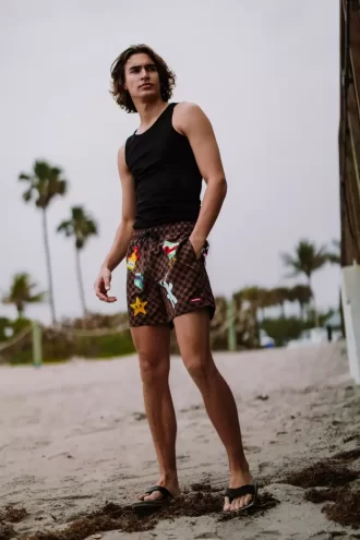 LET’S MAKE SOME NOISE SWIM SHORTS